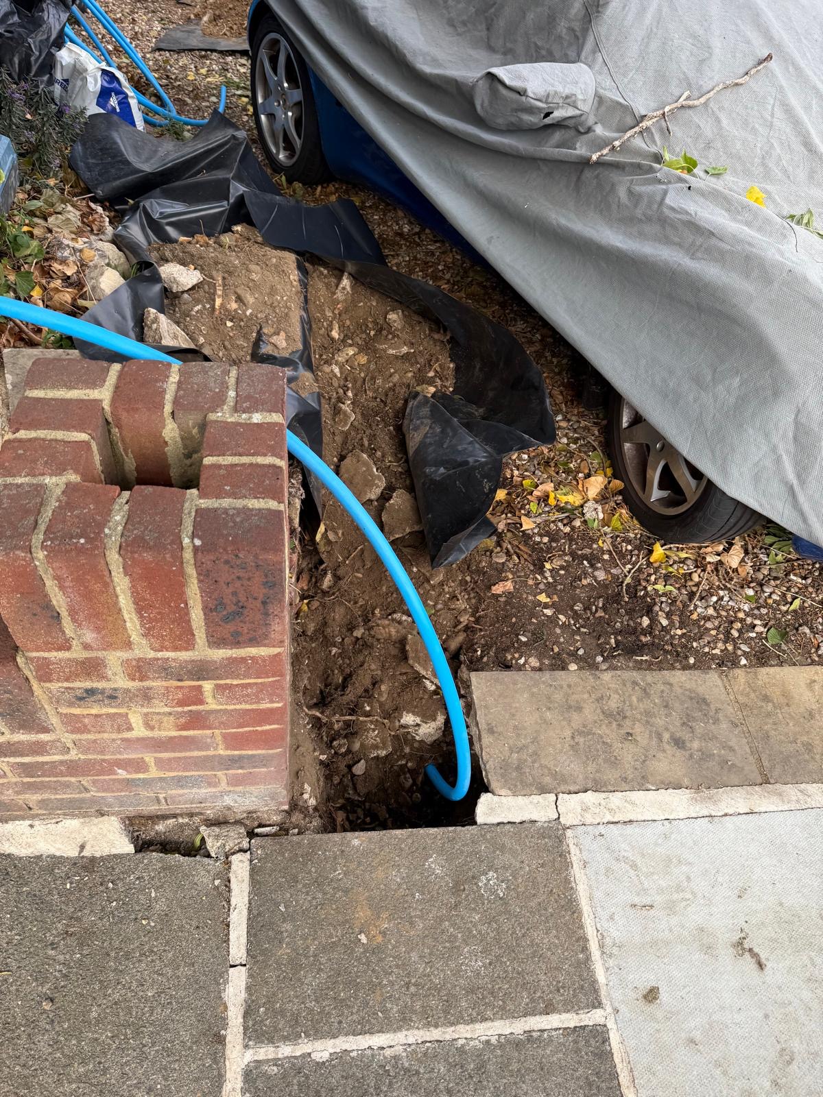 Moling project 1 — access pit showing completed MDPE connection