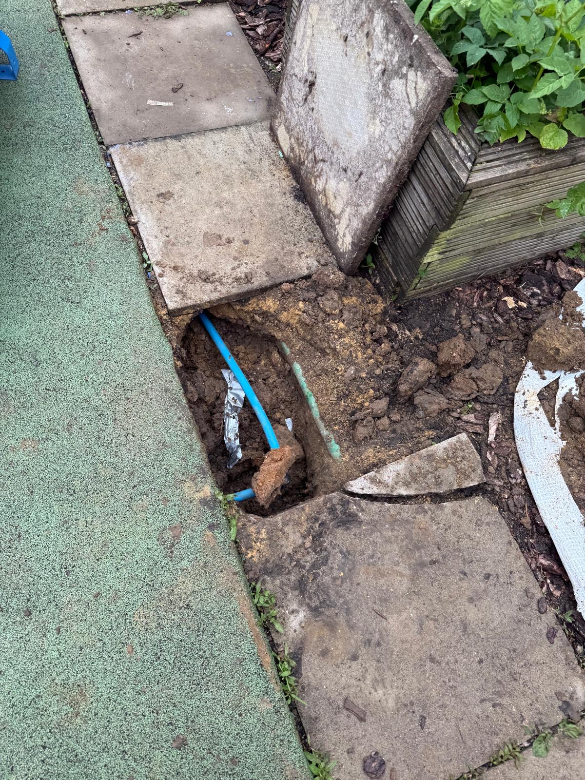 Moling project 2 — access pit at property with covered patio