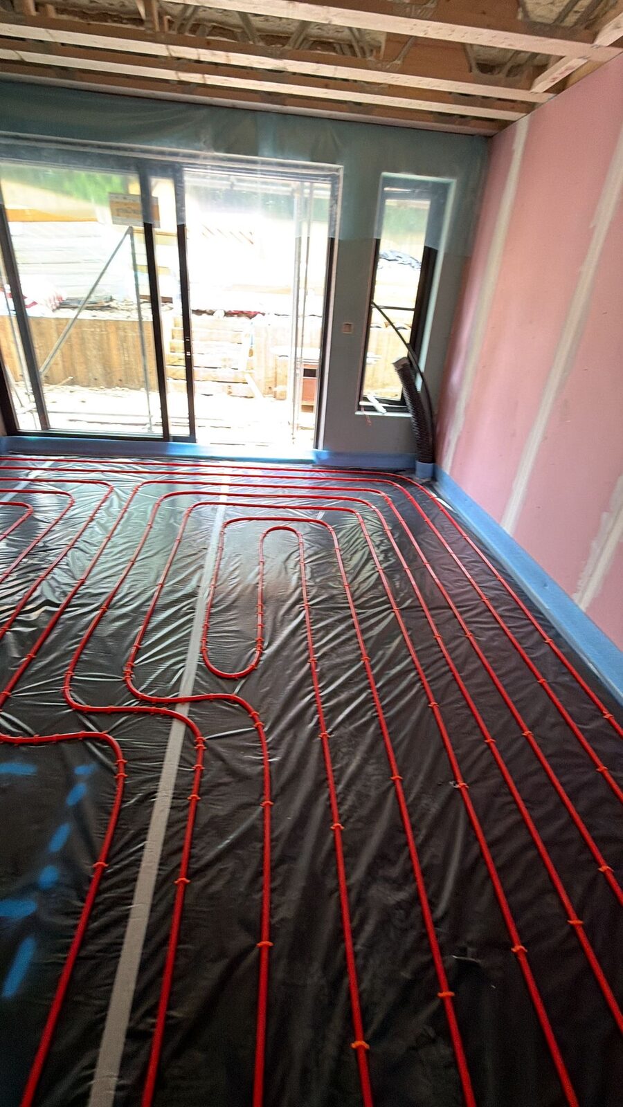 Room-by-room zoned wet underfloor heating installed in a London renovation by Meridian Plumbing